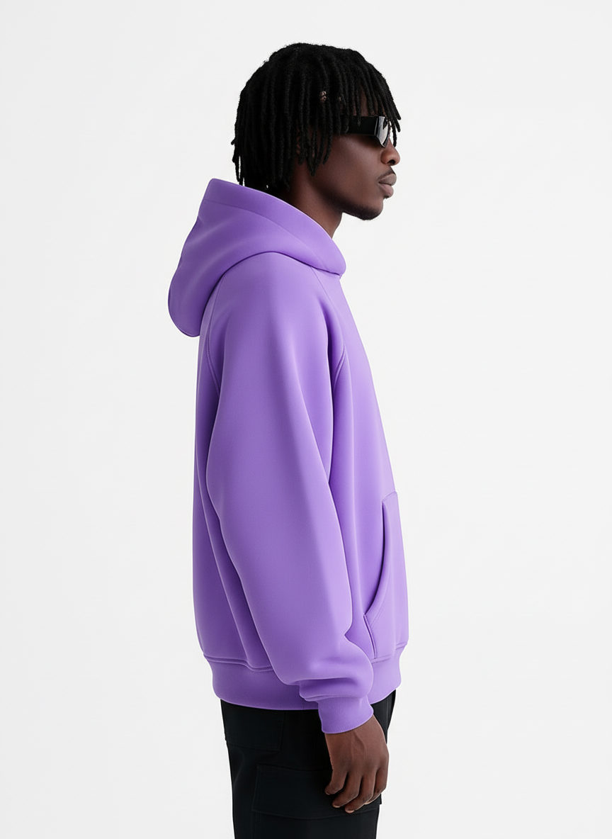 Person wearing a purple hoodie against a white background